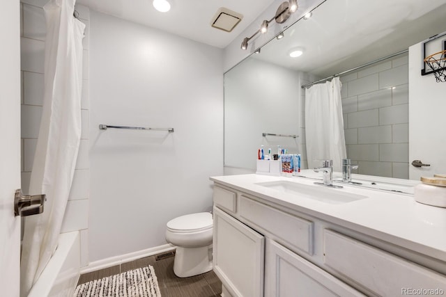 4356 S Blackhawk Way, Aurora, CO 80015 - bathroom featuring vanity and shower / bath combo with shower curtain