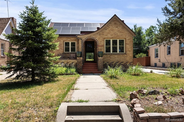 view of front of house with solar panels