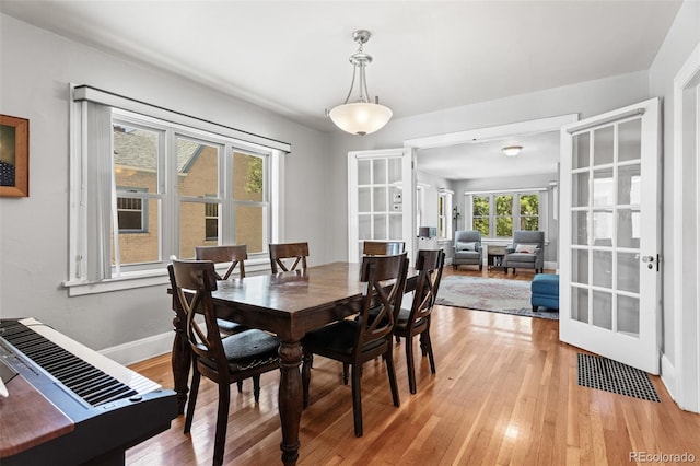 dining room featuring light hardwood / wood-style floors