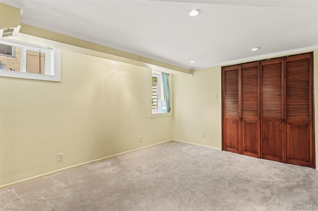 unfurnished bedroom with a closet and carpet floors