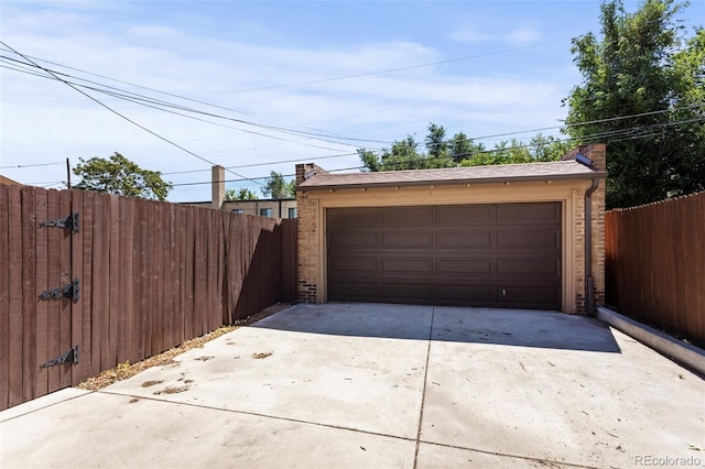 garage featuring wooden walls