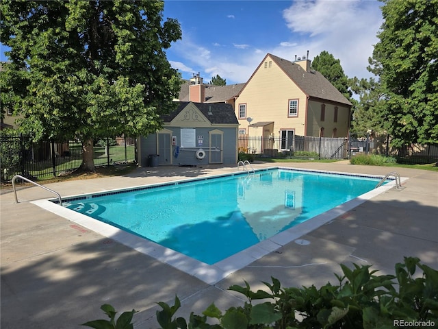 14232 E Hawaii Cir Unit A, Aurora, CO 80012 - community pool featuring a patio area