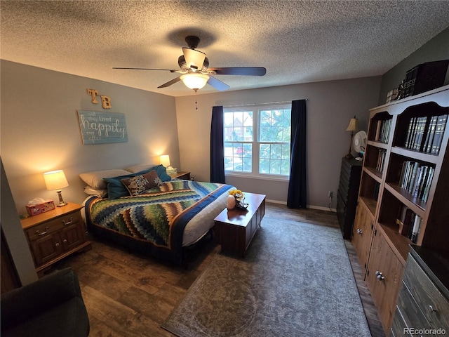 14232 E Hawaii Cir Unit A, Aurora, CO 80012 - bedroom featuring a textured ceiling and a ceiling fan