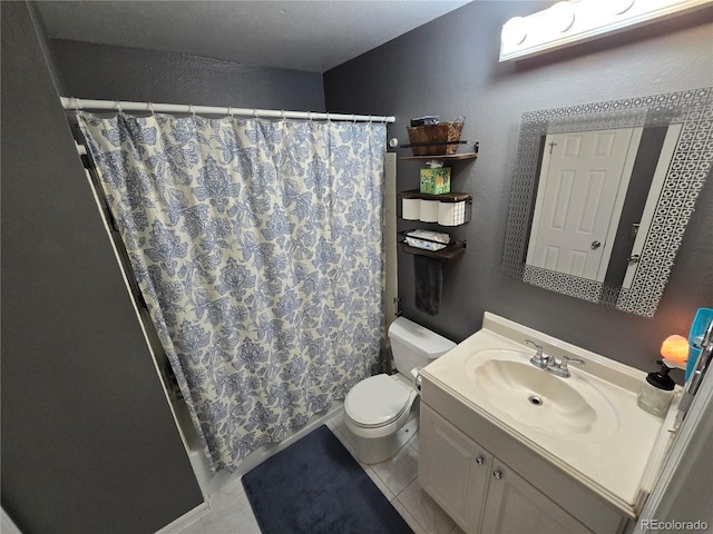 14232 E Hawaii Cir Unit A, Aurora, CO 80012 - bathroom with vanity, tile patterned floors, shower / tub combo with curtain, and a textured wall