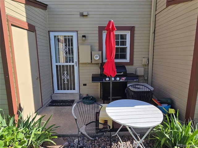 14232 E Hawaii Cir Unit A, Aurora, CO 80012 - view of patio featuring a grill