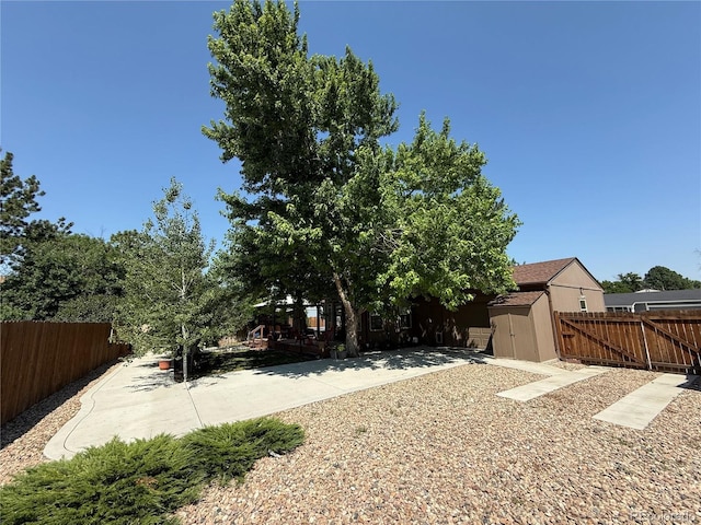 16796 E Union Ave, Aurora, CO 80015 - fenced backyard featuring a storage unit