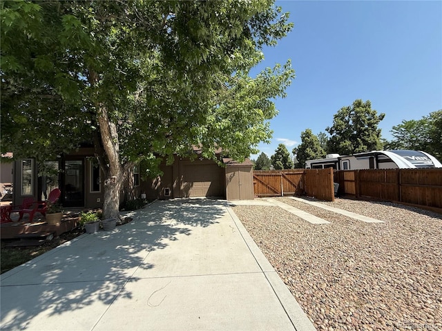 16796 E Union Ave, Aurora, CO 80015 - view of yard with a gate and a garage