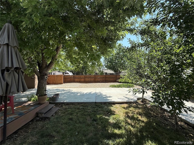 16796 E Union Ave, Aurora, CO 80015 - fenced backyard featuring a patio area and a wooden deck