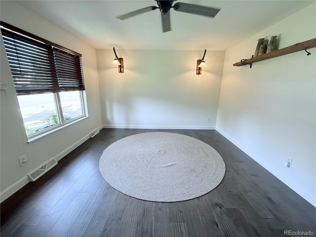 16796 E Union Ave, Aurora, CO 80015 - spare room with a ceiling fan and dark wood finished floors