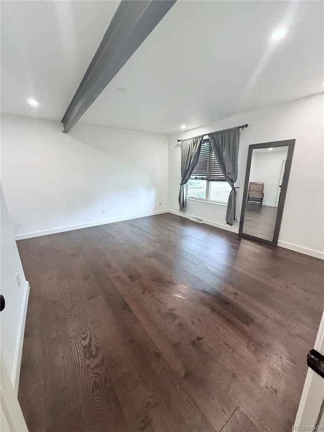 16796 E Union Ave, Aurora, CO 80015 - unfurnished living room with dark wood-style floors, recessed lighting, and beam ceiling