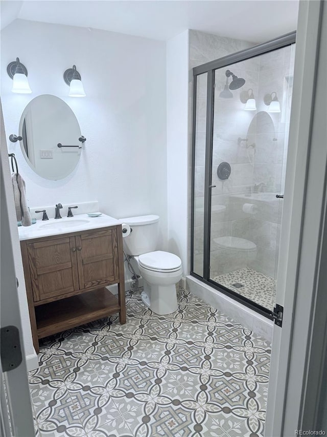 16796 E Union Ave, Aurora, CO 80015 - bathroom with vanity, a stall shower, and tile patterned floors