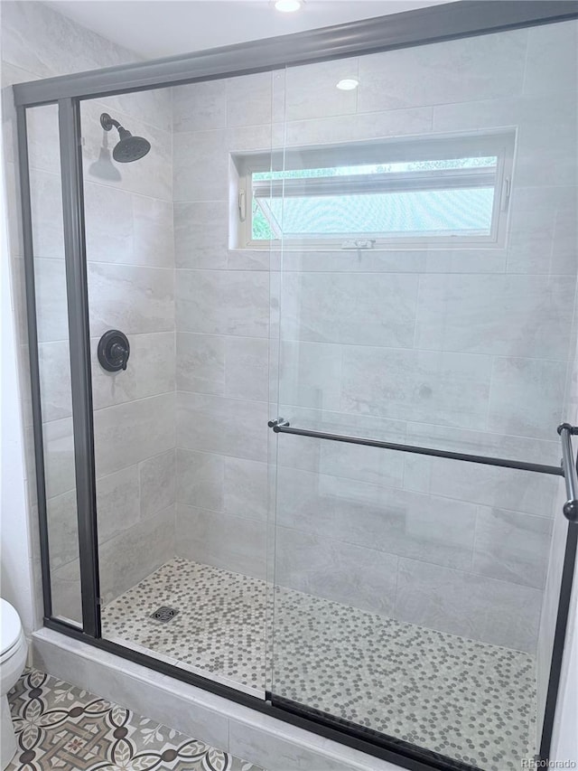 16796 E Union Ave, Aurora, CO 80015 - bathroom with a shower stall and tile patterned floors