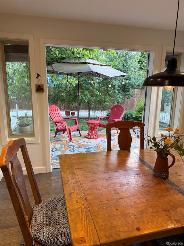 16796 E Union Ave, Aurora, CO 80015 - dining area with dark wood-style floors and baseboards