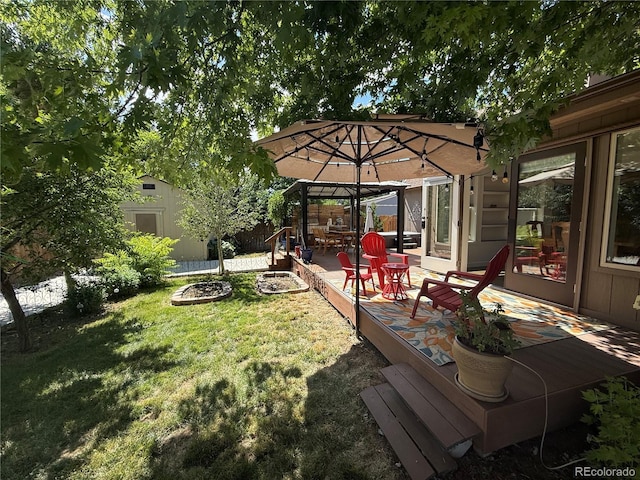 16796 E Union Ave, Aurora, CO 80015 - view of grassy yard featuring a wooden deck and a gazebo