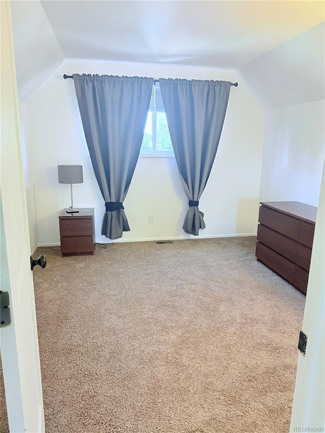 16796 E Union Ave, Aurora, CO 80015 - bedroom with vaulted ceiling and carpet flooring