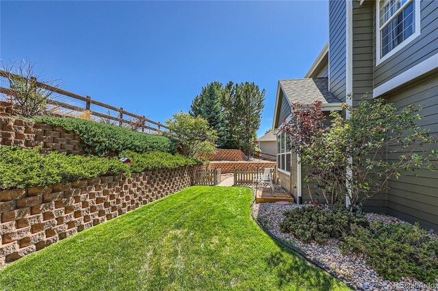 view of yard featuring fence