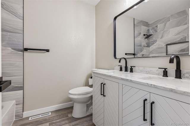 7351 S Marion St, Centennial, CO 80122 - bathroom with double vanity and wood finished floors