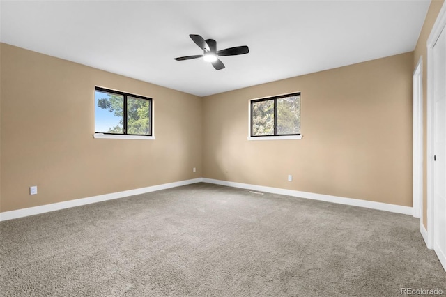 7351 S Marion St, Centennial, CO 80122 - carpeted empty room featuring healthy amount of natural light and a ceiling fan