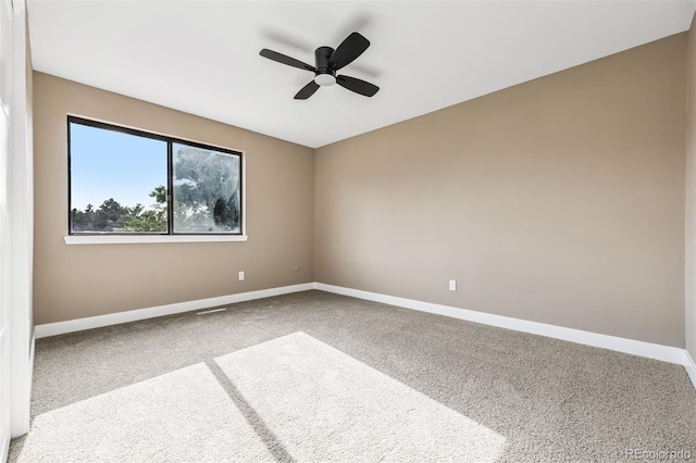 7351 S Marion St, Centennial, CO 80122 - carpeted spare room featuring baseboards and ceiling fan