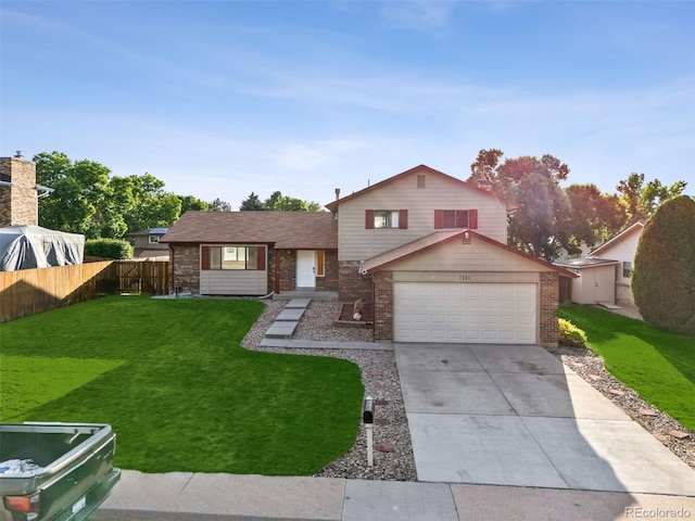 7351 S Marion St, Centennial, CO 80122 - split level home featuring brick siding, driveway, and a garage