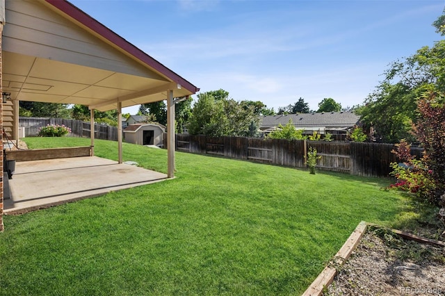 7351 S Marion St, Centennial, CO 80122 - fenced backyard featuring a patio area and a shed