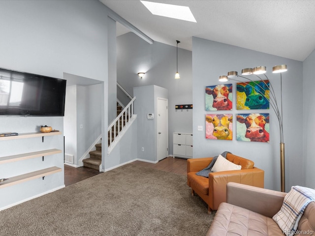 966 Cherry Blossom Ct, Highlands Ranch, CO 80126 - living area with carpet flooring, stairway, a skylight, and high vaulted ceiling