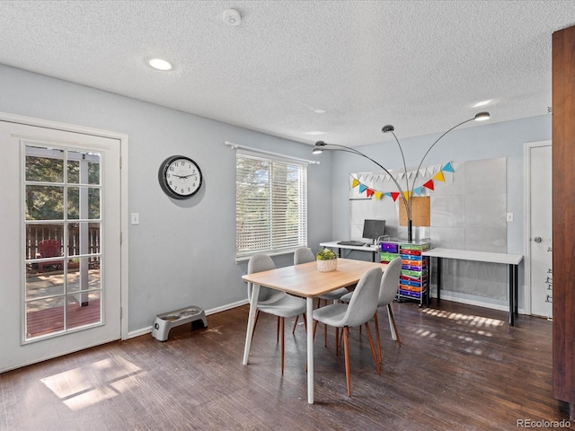 966 Cherry Blossom Ct, Highlands Ranch, CO 80126 - dining space featuring wood finished floors and a textured ceiling