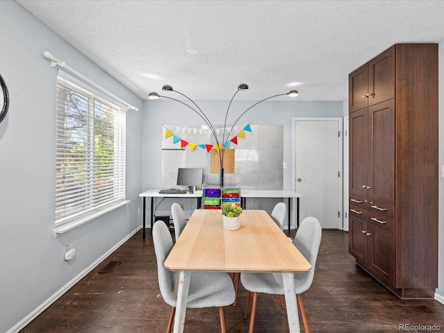 966 Cherry Blossom Ct, Highlands Ranch, CO 80126 - dining area with a textured ceiling and dark wood-style flooring