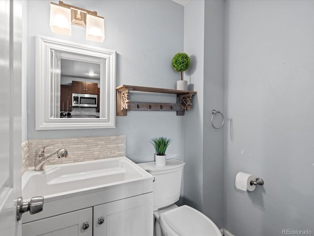 966 Cherry Blossom Ct, Highlands Ranch, CO 80126 - half bath featuring toilet and vanity