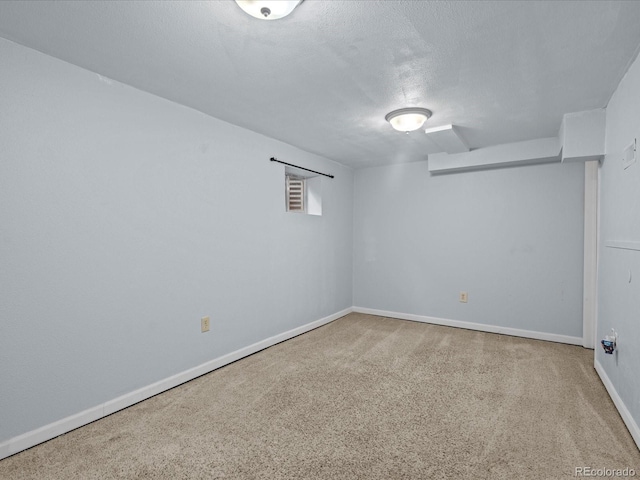 966 Cherry Blossom Ct, Highlands Ranch, CO 80126 - basement featuring a textured ceiling and baseboards