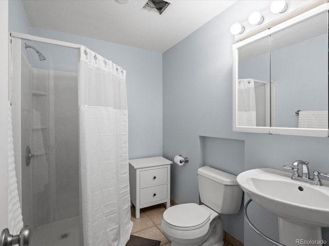 966 Cherry Blossom Ct, Highlands Ranch, CO 80126 - full bathroom featuring a shower stall and tile patterned flooring