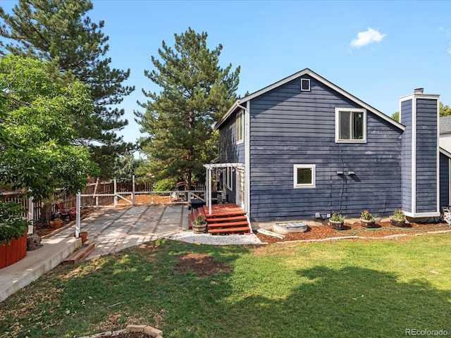 966 Cherry Blossom Ct, Highlands Ranch, CO 80126 - back of house with a patio area and a wooden deck