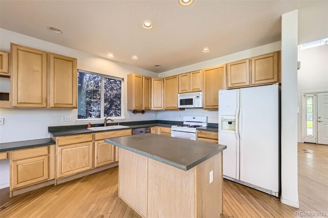 1730 Pear Ct, Brighton, CO 80601 - kitchen featuring white appliances, light brown cabinets, dark countertops, light wood-type flooring, and recessed lighting