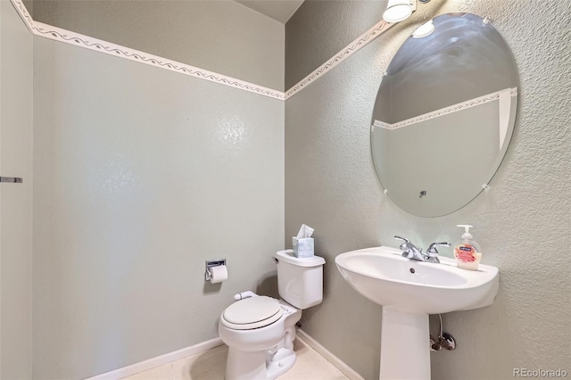 1730 Pear Ct, Brighton, CO 80601 - half bath featuring toilet and a textured wall