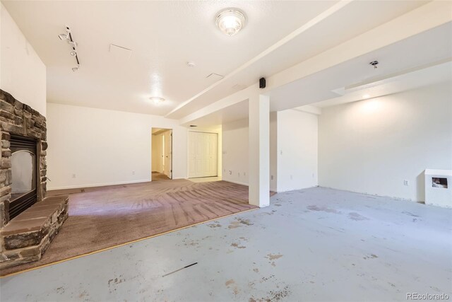 1730 Pear Ct, Brighton, CO 80601 - below grade area featuring a fireplace