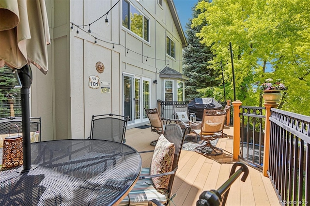 775 Poppywood Dr, Highlands Ranch, CO 80126 - wooden terrace featuring outdoor dining space, grilling area, and french doors