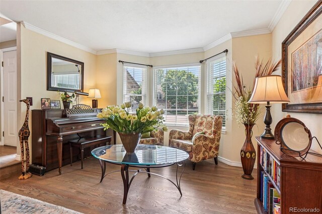 775 Poppywood Dr, Highlands Ranch, CO 80126 - living area with wood finished floors and ornamental molding