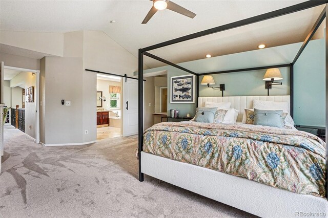 775 Poppywood Dr, Highlands Ranch, CO 80126 - bedroom with carpet flooring, lofted ceiling, a barn door, connected bathroom, and recessed lighting