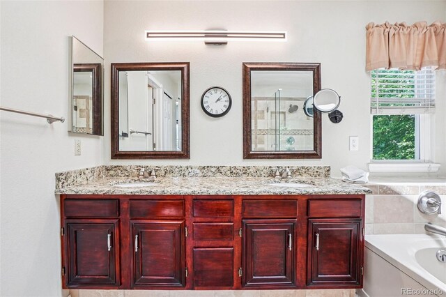 775 Poppywood Dr, Highlands Ranch, CO 80126 - full bathroom featuring double vanity, a garden tub, and a shower with shower door