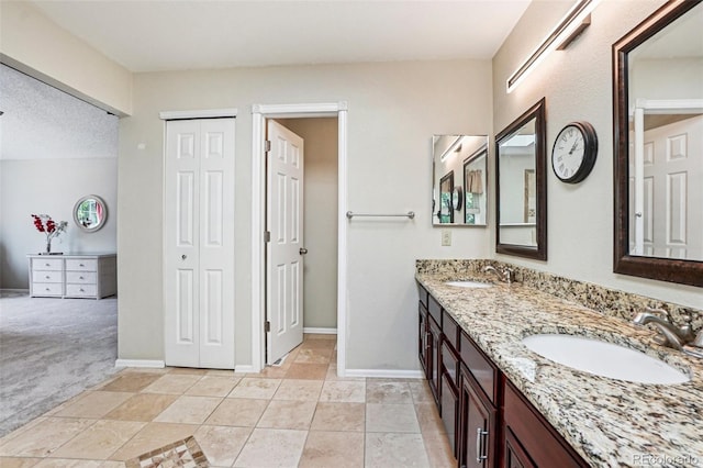 775 Poppywood Dr, Highlands Ranch, CO 80126 - full bathroom with double vanity and a closet