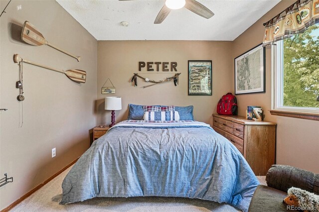 775 Poppywood Dr, Highlands Ranch, CO 80126 - carpeted bedroom with multiple windows and ceiling fan