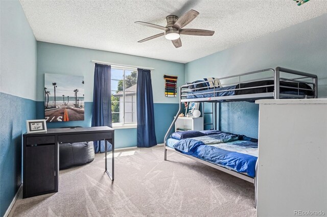 775 Poppywood Dr, Highlands Ranch, CO 80126 - bedroom featuring carpet flooring, a textured ceiling, and a ceiling fan