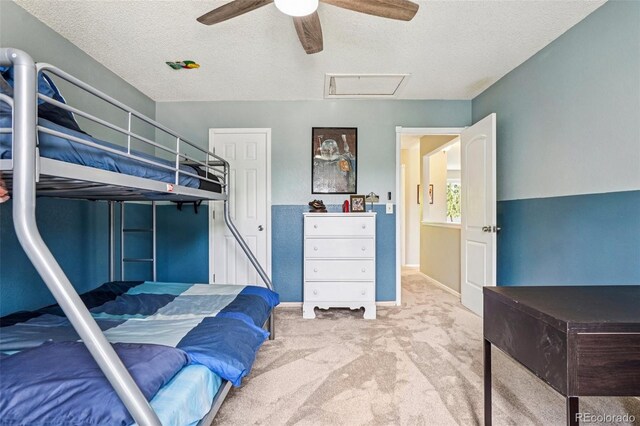 775 Poppywood Dr, Highlands Ranch, CO 80126 - bedroom with attic access, carpet flooring, a textured ceiling, and ceiling fan