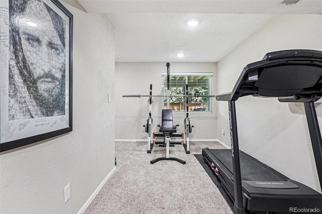 775 Poppywood Dr, Highlands Ranch, CO 80126 - exercise room with a textured wall, carpet, a textured ceiling, and recessed lighting