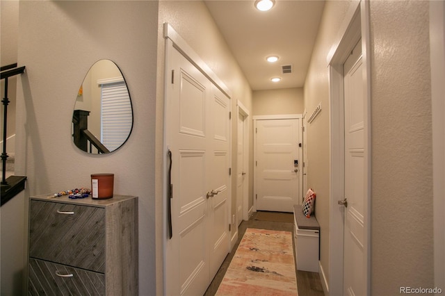 10018 E 62nd Ave, Denver, CO 80238 - hallway with recessed lighting and light wood-style flooring