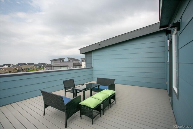 10018 E 62nd Ave, Denver, CO 80238 - deck with outdoor dining area and a residential view