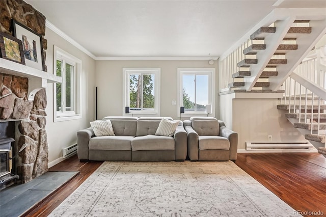 150 Cedar Rd, Evergreen, CO 80439 - living room featuring a baseboard radiator, stairs, crown molding, wood finished floors, and healthy amount of natural light