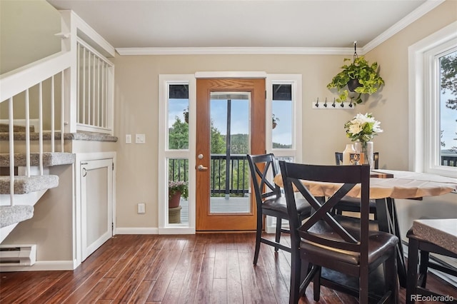 150 Cedar Rd, Evergreen, CO 80439 - dining room with dark wood-style floors, crown molding, and stairway