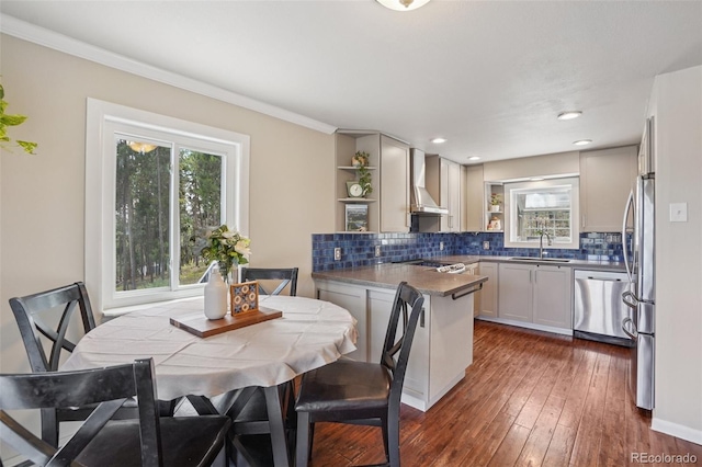 150 Cedar Rd, Evergreen, CO 80439 - kitchen featuring stainless steel appliances, wall chimney range hood, open shelves, tasteful backsplash, and ornamental molding