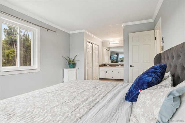 150 Cedar Rd, Evergreen, CO 80439 - bedroom featuring ornamental molding, a closet, connected bathroom, and wood finished floors